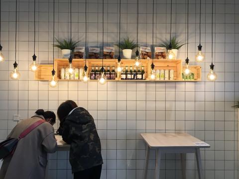Modern wooden TV cabinet with flat screen setup for living room by MAJISA Furniture.